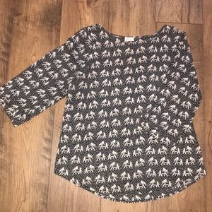 A FUN elephant print 1/4 sleeve blouse!